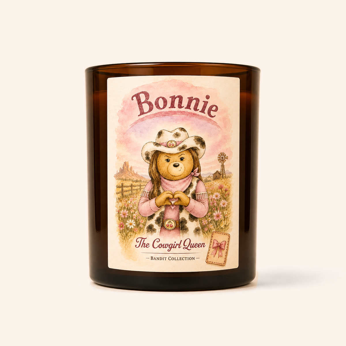 Bonnie candle in an amber jar with an illustrated character label.
