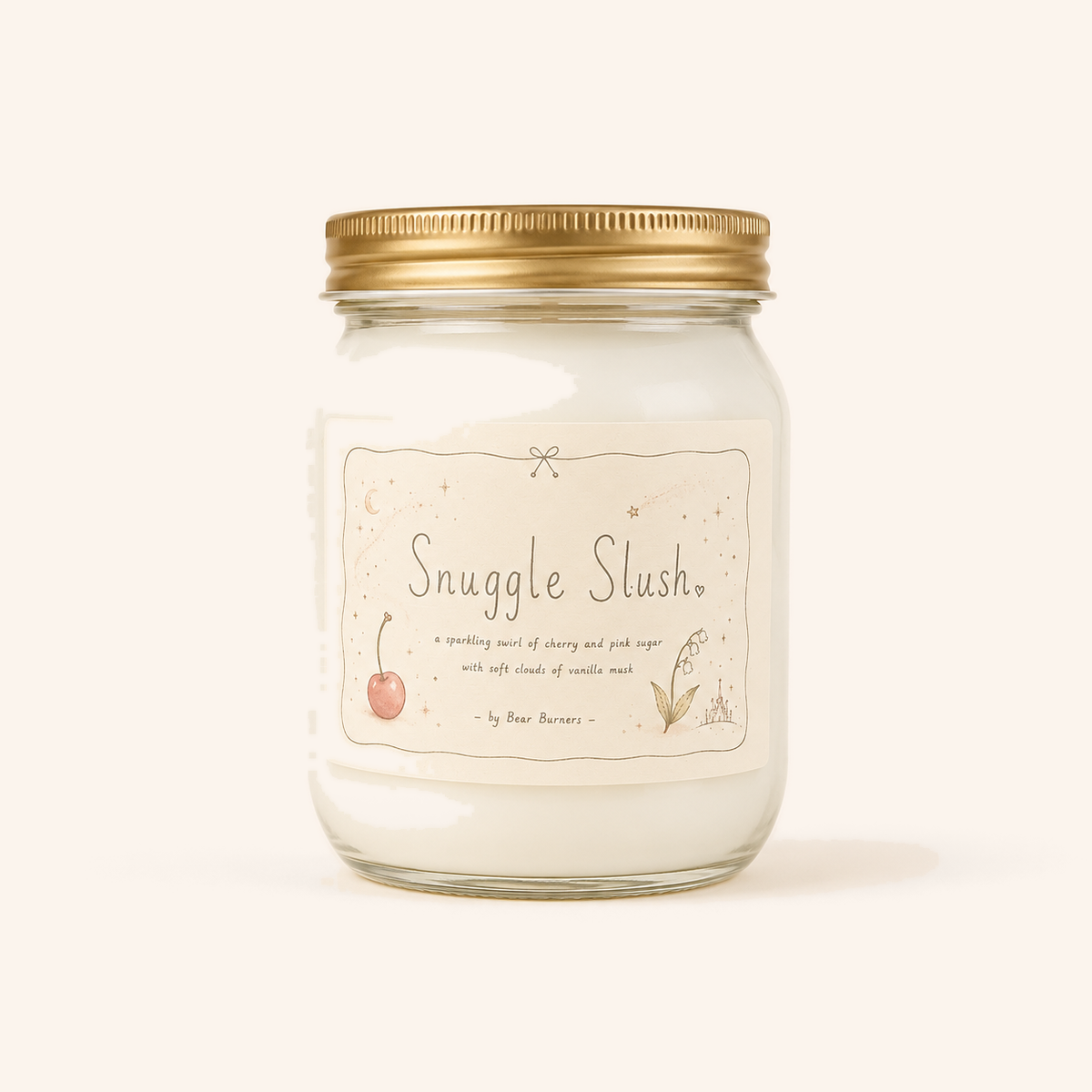 Snuggle Slush candle in a clear glass jar with a gold lid and illustrated cream label.