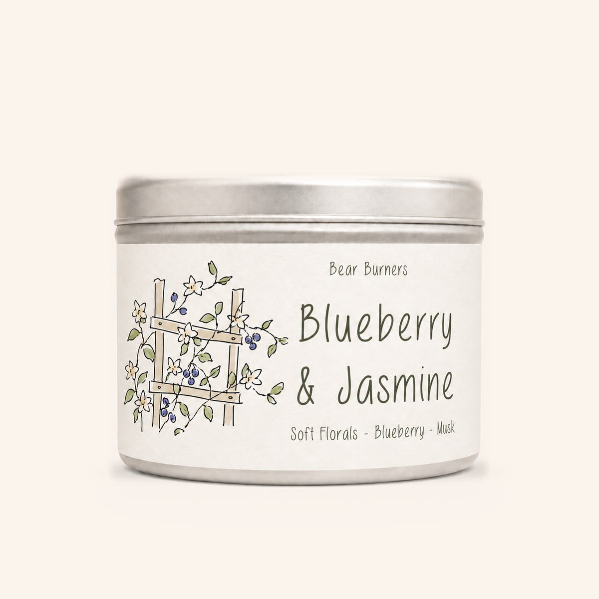 Blueberry & Jasmine candle in a silver lidded tin with an illustrated cream label.
