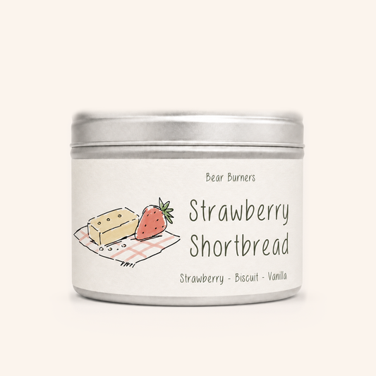 Strawberry Shortbread candle in a silver lidded tin with an illustrated cream label.