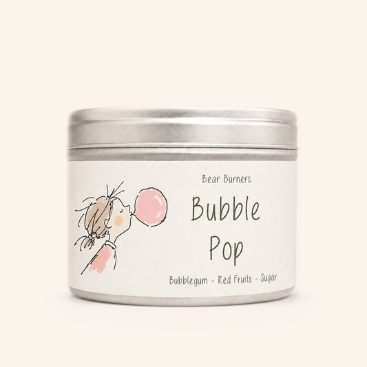 Bubble Pop candle in a silver lidded tin with an illustrated cream label.