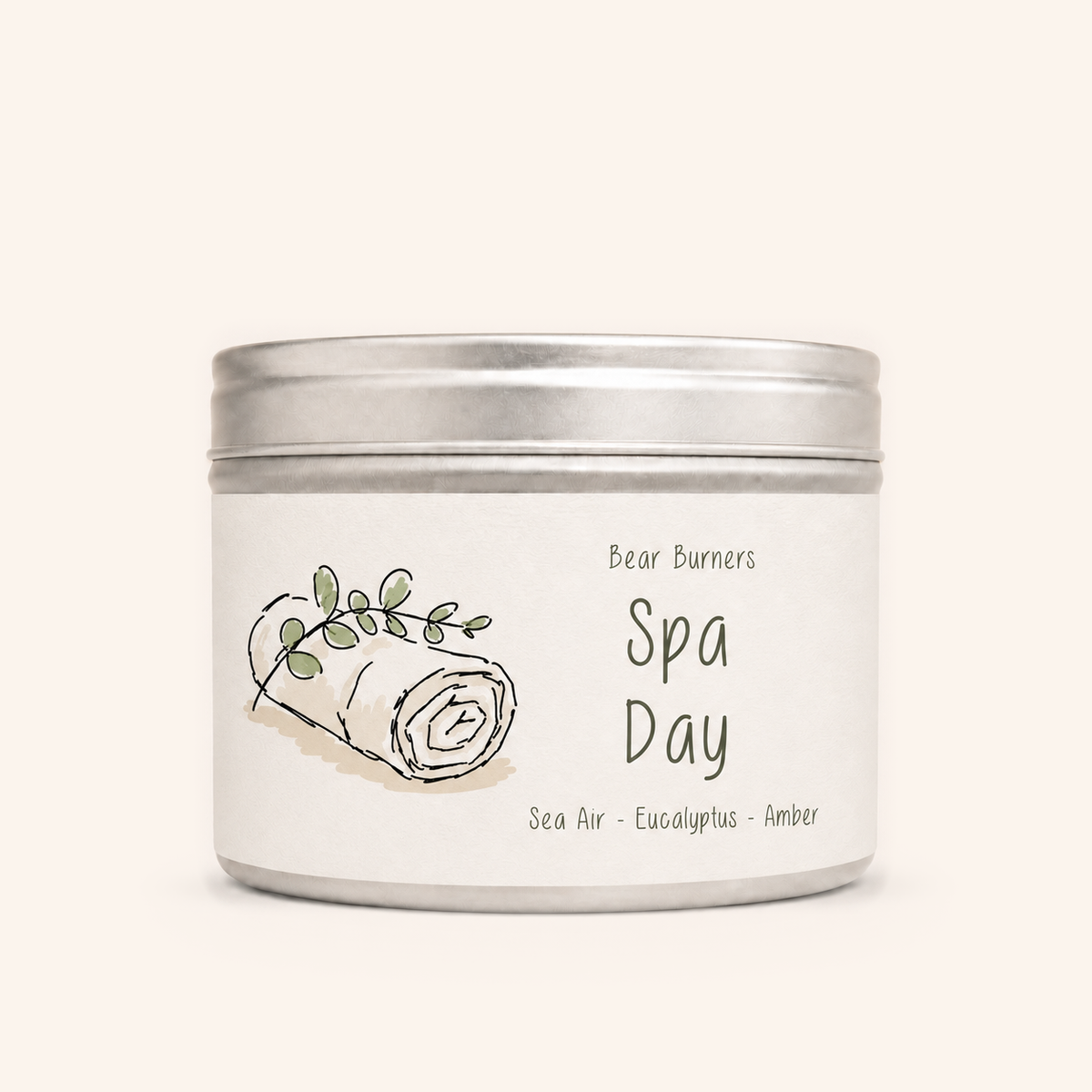 Spa Day candle in a silver lidded tin with an illustrated cream label.