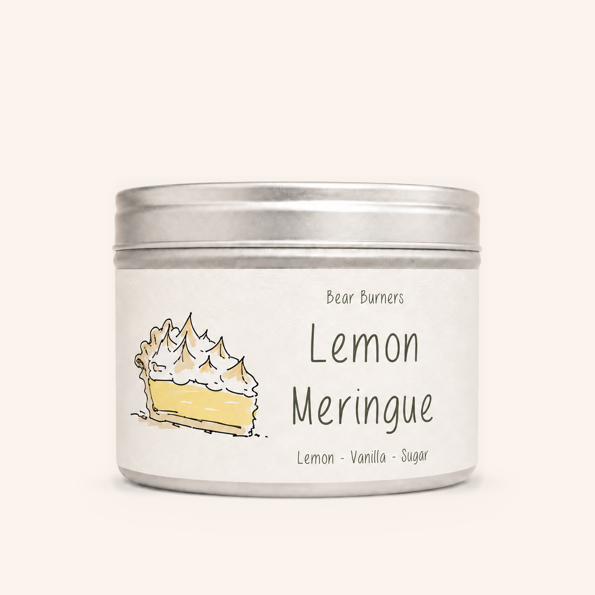 Lemon Meringue candle in a silver lidded tin with an illustrated cream label.